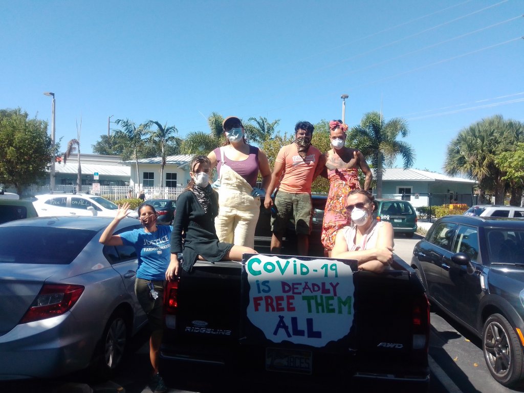 CHIP Volunteers in the bed of a truck at one of our rallys